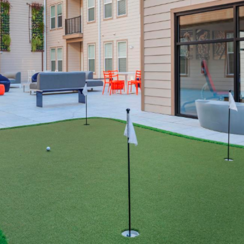 Show off your athletic skills on our putting green Putting green with outdoor furniture