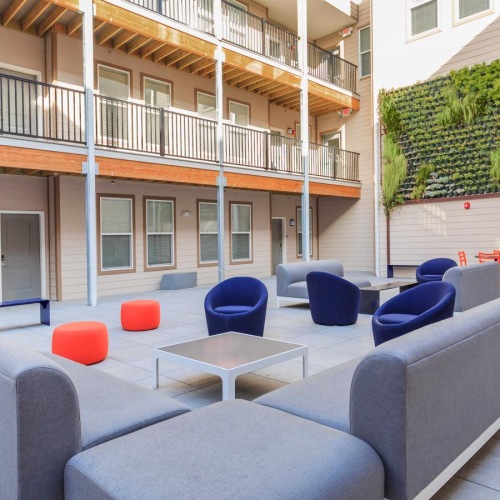 Connect with fellow students at our outdoor lounge outdoors with a few chairs and tables